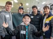 TEAMWORK: Tyrese Holland,10, of Penguin, with Bailey Menzies, 16, of Hobart, Megan Lockett and Nic Hermes, both of Launceston, and New Horizons chief executive Belinda Kitto. Picture: Paul Scambler