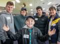 TEAMWORK: Tyrese Holland,10, of Penguin, with Bailey Menzies, 16, of Hobart, Megan Lockett and Nic Hermes, both of Launceston, and New Horizons chief executive Belinda Kitto. Picture: Paul Scambler