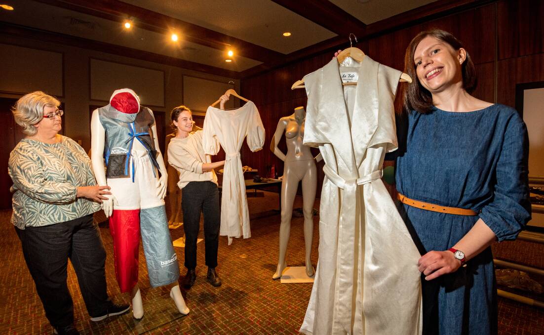 FASHION: Graduates of TasTAFE's certificate IV in applied fashion, design, and merchandising, Chris Bingham, Isabel Fulton, an Danielle Blay with the garments they created out of hemp textiles, set to be displayed at this year's Australian Industrial Hemp Conference. Picture: Phillip Biggs