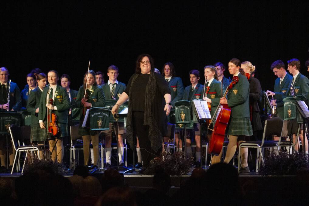 A MUSICAL LEGACY: Jessica Borton with students of St Patrick's College at the school's 2021 Winter Concert. Picture: Supplied
