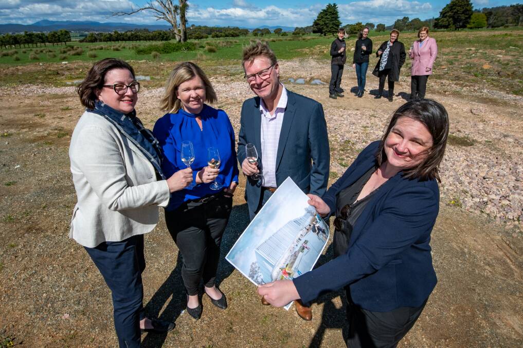 BUBBLING PERSONALITIES: Kim Seagram, Bridget Archer, West Tamar Council general manager Rolph Vos and FermenTas chief executive Karina Damberg celbrate on site at Legana. Picture: Paul Scambler