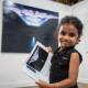 KIDS' PICK: Joann Arun, 3, of Evandale looks at the children's choice winning painting "High Moon" by Mark McCarthy of Victoria. Picture: Paul Scambler