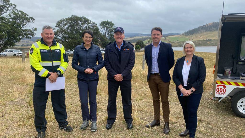 FIRE FIGHTING: TFS member Michael Goldsmith, Minister Jacquie Petrusma, TFS chief officer Dermot Barry, Senator Jonathon Duniam and Liberal candidate Susie Bower.