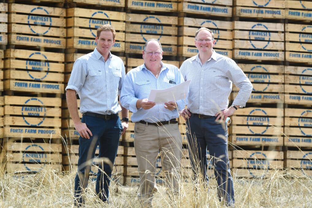 Grant: Harvest Moon onion production manager Rob Armstrong and founder Neil Armstrong with State Growth Minister Roger Jaensch announcing recipients of the Building Project Support Program. Picture: Brodie Weeding