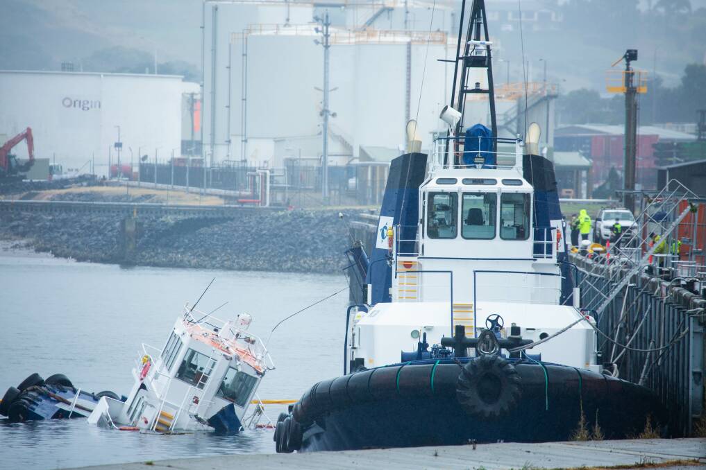 The aftermath of the boat crash in Devonport on Friday, which resulted in two tugboats sinking. Picture: Eve Woodhouse.