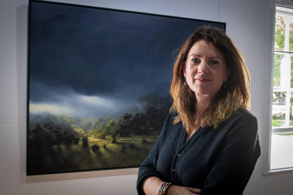 FINAL AWARDS: Glover Prize curator Megan Dick with People's Choice Award winner "Hidden Seclusion" by Victorian artist Peter Watts. Picture: Paul Scambler 