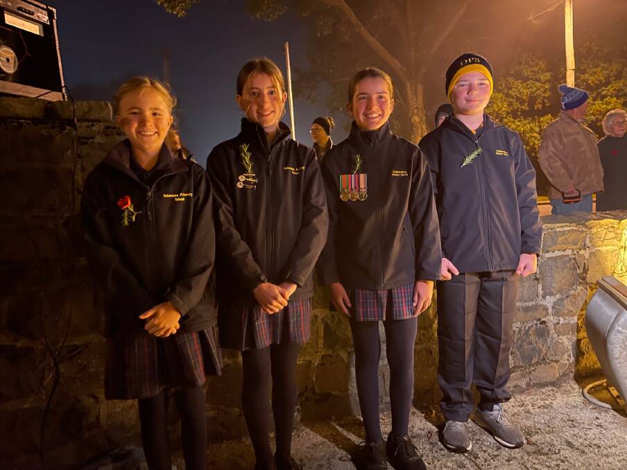 LEST WE FORGET: Chloe Neate, Mina Humphreys, Ruby Atkins and Sam Crawford of Deloraine Primary School addressed the dawn service. Picture: Supplied