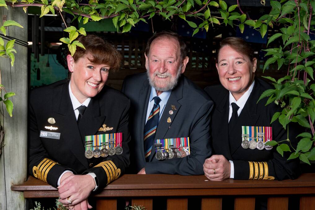 HOMECOMING: Captains Lisa Batchler and Melanie Verho with their father David Batchler. Picture: Phillip Biggs