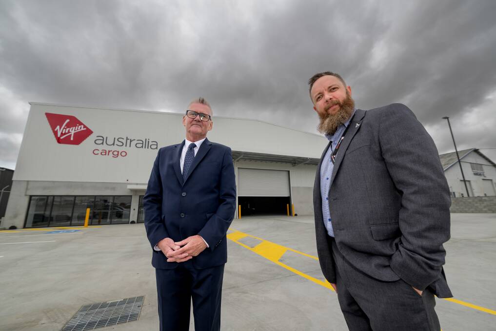 Launceston Airport CEO Shane O'Hare and Virgin Australia cargo operations manager Fin Blyth outside the new cargo facility at Launceston Airport. Picture by Phillip Biggs