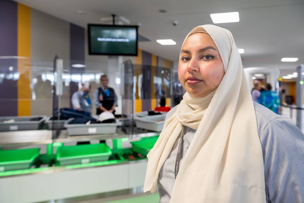 Aviation Protection Officer Mishkat Sultana at Launceston Airport's new security screening point. Picture by Phillip Biggs
