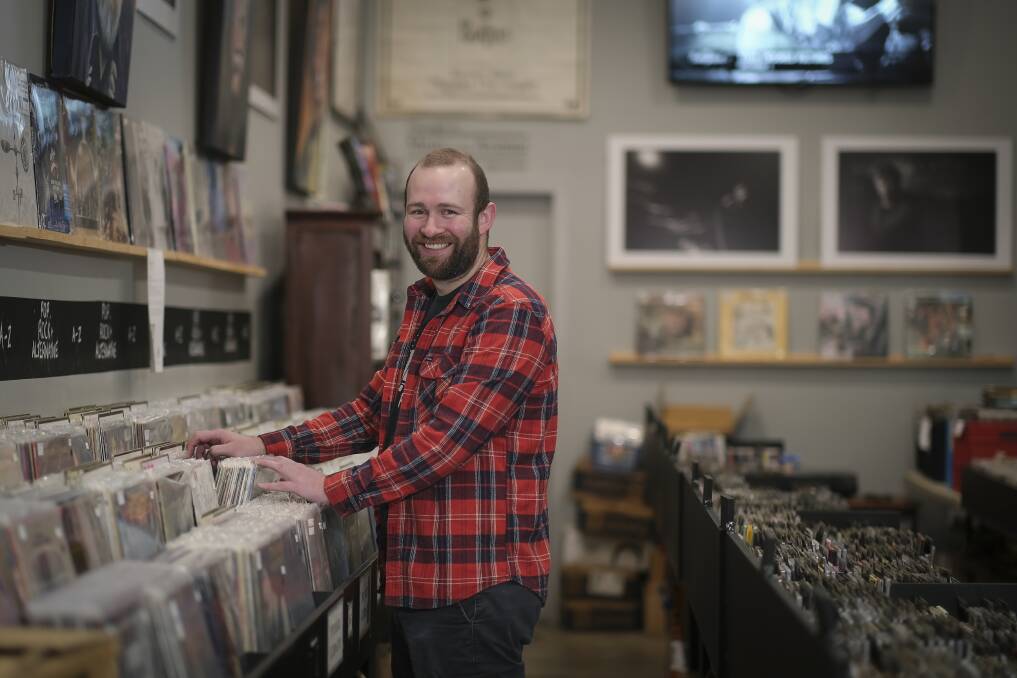 Avenue Records owner Callum Nobes says physical media like vinyl LPs and CDs are experiencing a resurgence. Picture by Craig George.