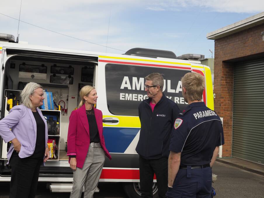 Anita Dow, Rebecca White, HACSU industrial manager Lucas Digney and Matthew Eldridge discuss Labor's paramedic policy. Picture by Joe Colbrook