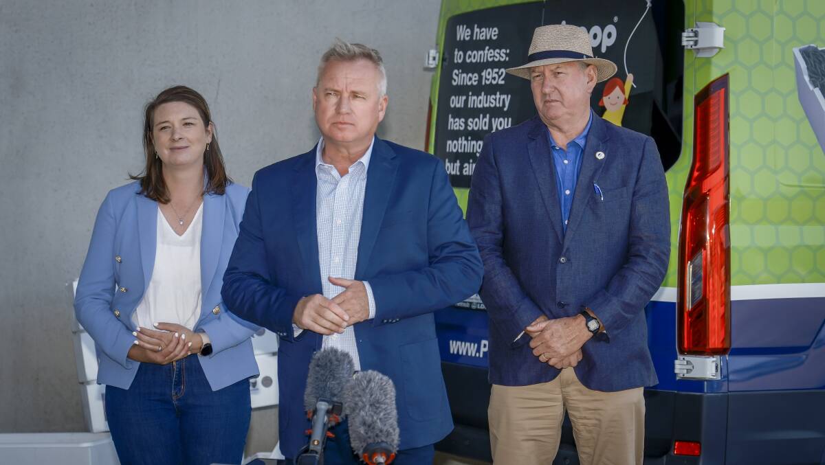 Premier Jeremy Rockliff (centre), pictured during a visit to Westbury, said he was 'actively considering' an early election after failing to reach an agreement with independent MPs. Picture by Craig George