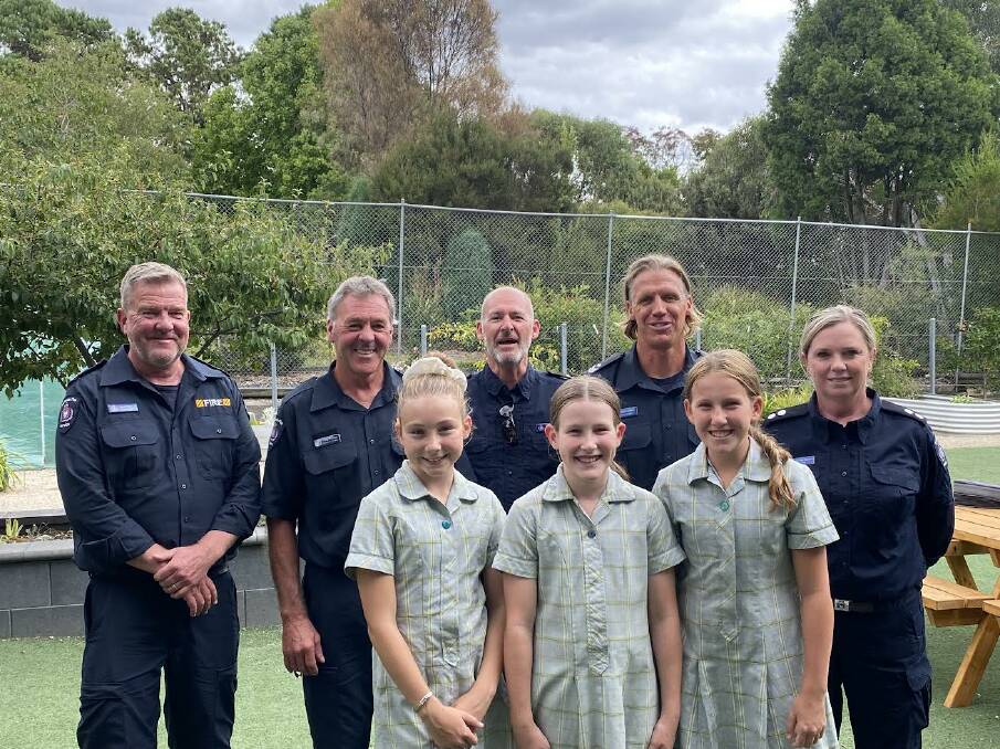 Members of the TFS School Fire Education Program with students from St Thomas Mores Catholic School celebrated the program's 30th anniversary. Picture by Tasmania Fire Service