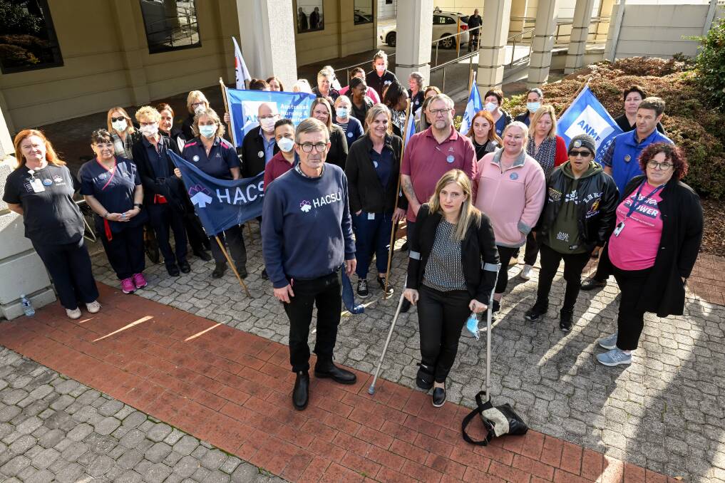 HACSU assistant state secretary Lucas Digney and ANMF Tasmanian branch secretary Emily Shepherd showed support to workers at Launceston General Hospital. Picture by Philip Biggs 