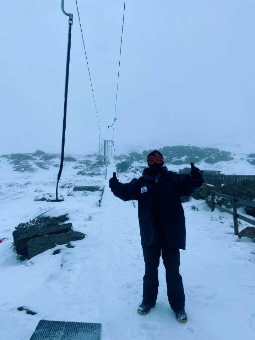 SNOW SEASON: Lift operator Sanday Lawson on Village Poma, Ben Lomond over the weekend after heavy snowfall. Picture: Supplied