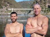 CHILLY CHARITY: Parker Hill and Jade Child, at the Cataract Gorge for a cold dip in preparation for the Solstice Splash in June. Picture: Paul Scambler