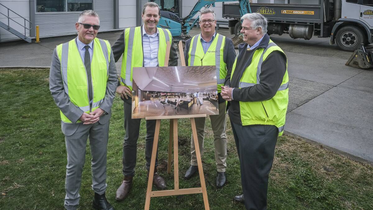 CEO Launceston Airport Shane O'Hare, Deputy Premier Michael Ferguson, Liberal Member for Bass Simon Wood, Member for Lyons Brian Mitchell with a design of the $11m terminal expansion. Picture: Craig George