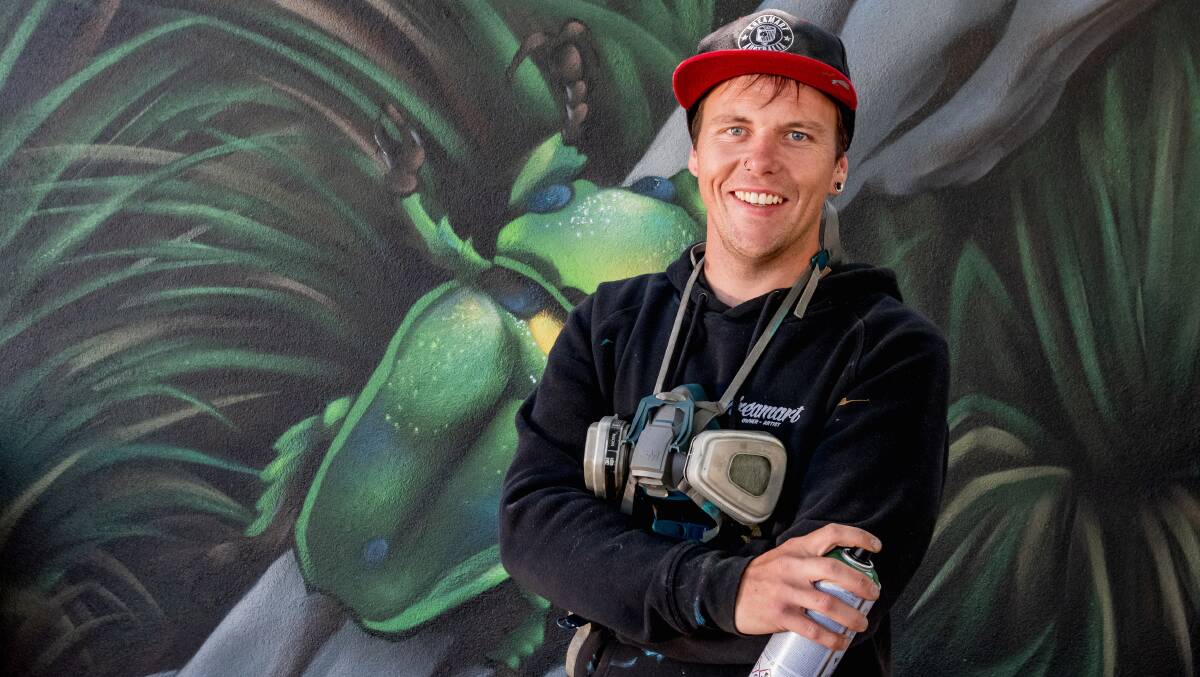 Graffiti artist James Cowan would like to see more street murals in the CBD. Picture by Phillip Biggs.