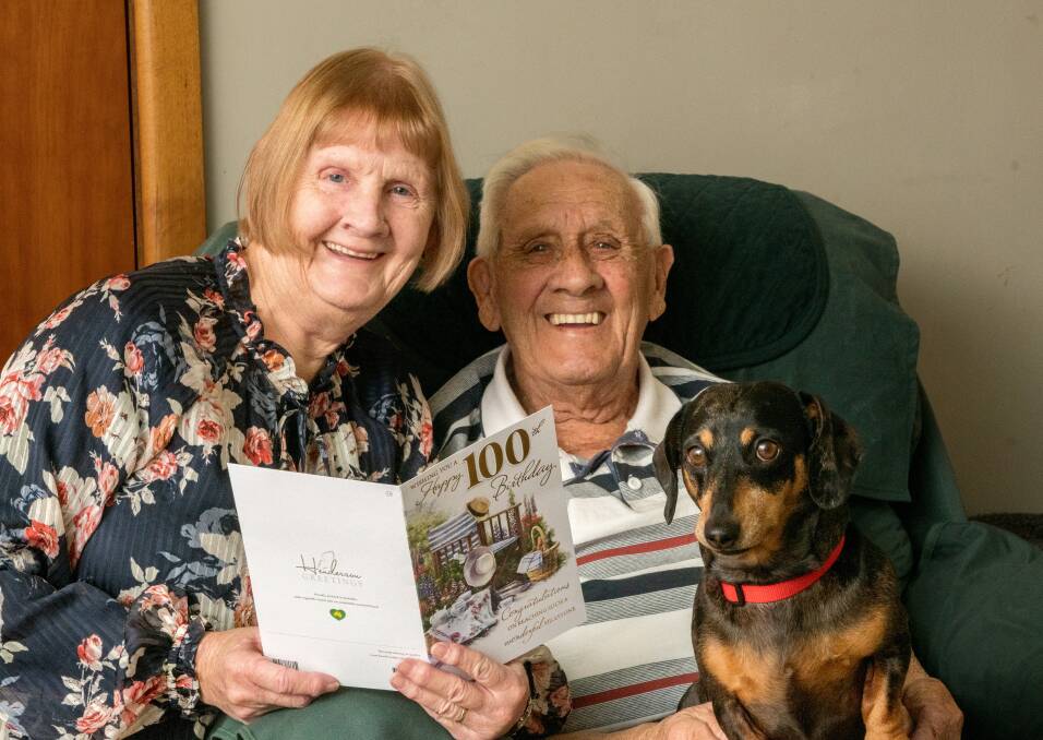 Sue Barker with her father Raymond Atley, of South Launceston, who turns 100 today along with his dog Poppy. Picture: Phillip Biggs