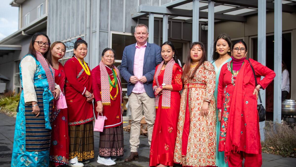 UNITED IN PINK: Members of the Nepalese community with Tasmanian Premier, Jeremy Rockcliff. Picture: Paul Scambler