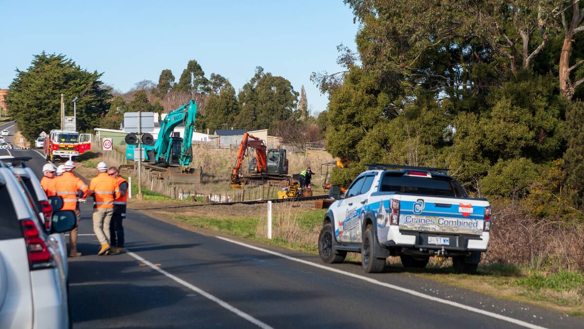 Tasmania Police confirmed on Wednesday afternoon that a man had died after an excavator rollover on a rail line at Evandale. Picture: Phillip Biggs