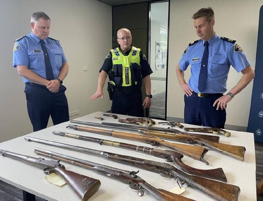 Police examine various types of antique guns that are now subject to full licencing requirements. Picture Tasmania Police