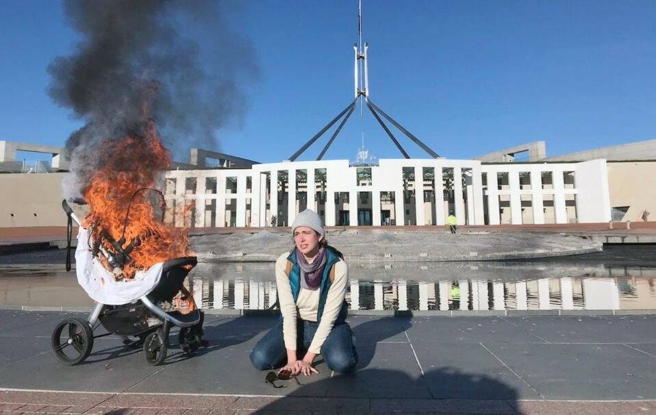 Deanna "Violet" Coco set fire to a pram outside Parliament House during a 2021 climate protest. Source: Fireproof Australia
