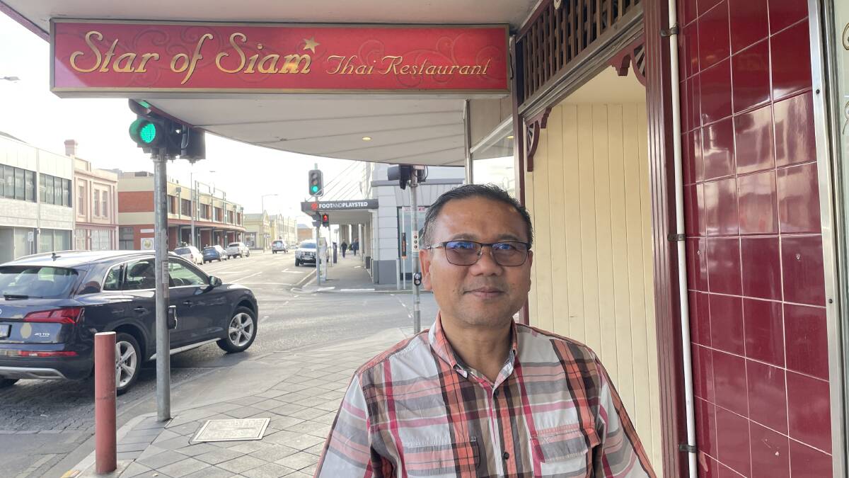 BACK IN BUSINESS: Therdsak Dansuckchai outside his restaurant in Launceston. Picture: Ben Seeder