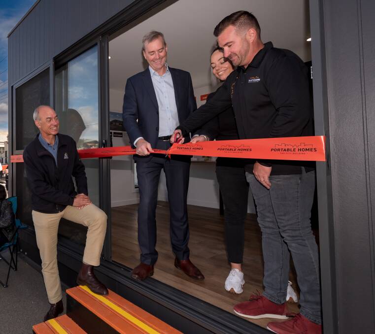 Steve Simeoni (R) with Treasurer Michael Ferguson (C) and Guy Barnett at the launch of his Portable Homes business earlier this year. File Photo