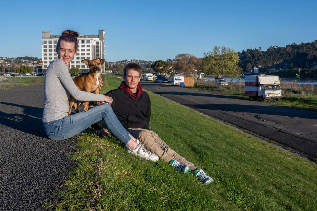 Trent Kiely and Chloe Hume with their dog Rocky. Picture by Paul Scambler 