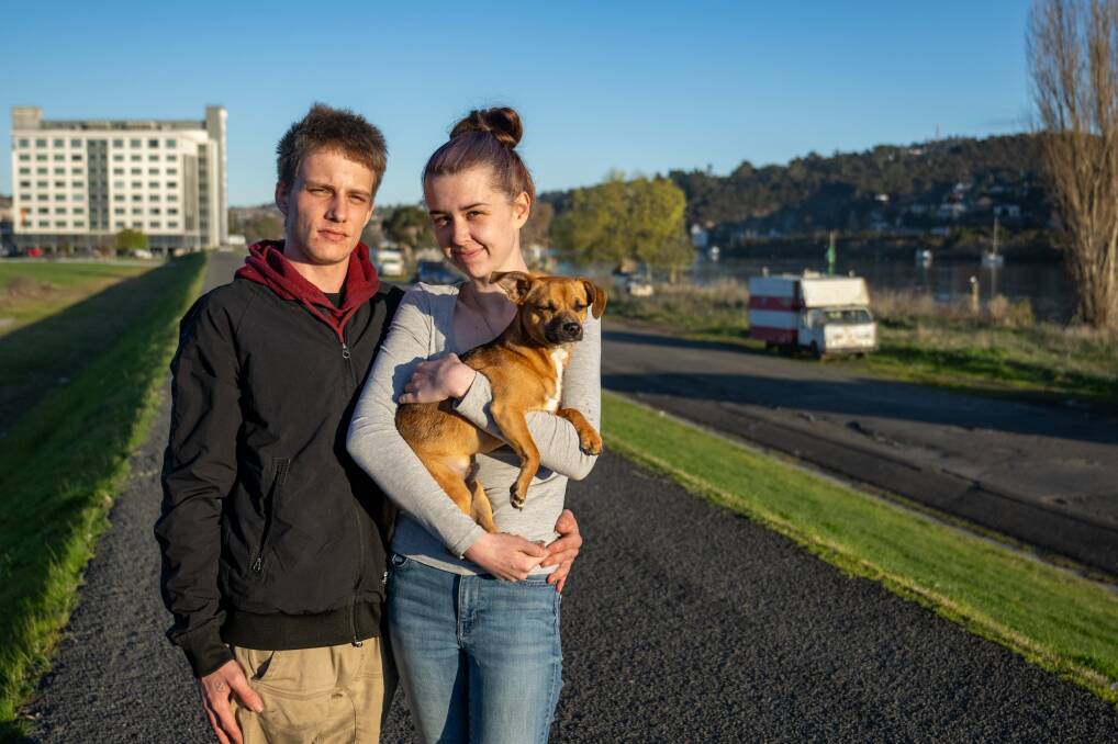 Trent Kiely and Chloe Hume with their dog Rocky. Picture by Paul Scambler 