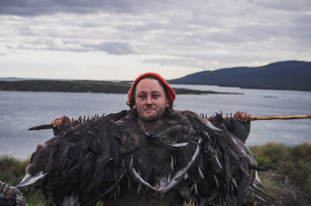 Jamie Graham-Blair following a mutton bird harvest on Aboriginal land, on Big Dog Island. Picture by Djuker Hart
