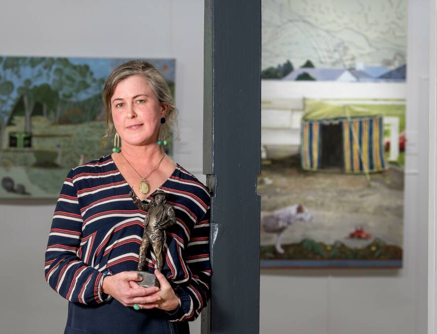 The 2023 Glover Prize winner Jo Chew, of Hobart, in front of her painting "Tender". Picture by Phillip Biggs