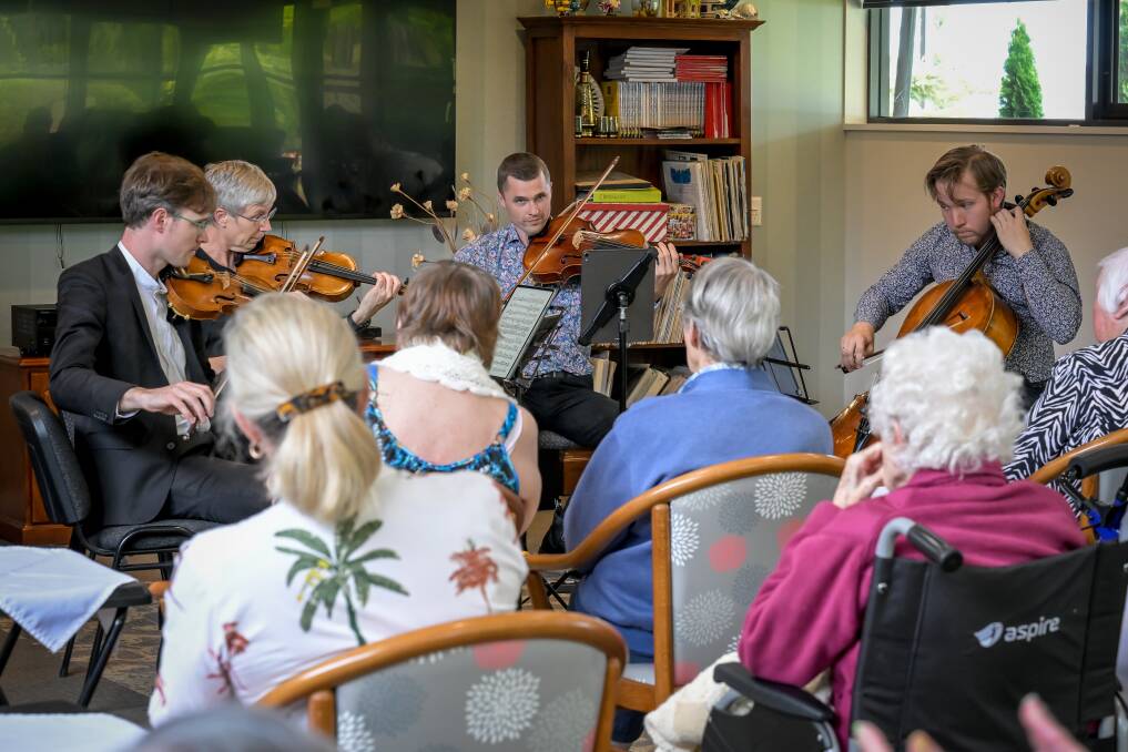 Thibaud Pavlovic-Hobba, Jenny Owen, Doug Coghill, and Jonathan Bekes perform for Uniting AgeWell residents at Newnham. Picture by Craig George