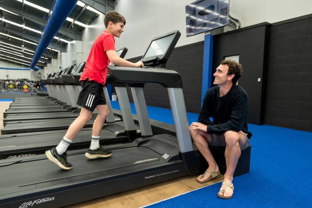 Khye Johnston and Timmy Bristow on the treadmill at LIFT gym. Picture Phillip Biggs
