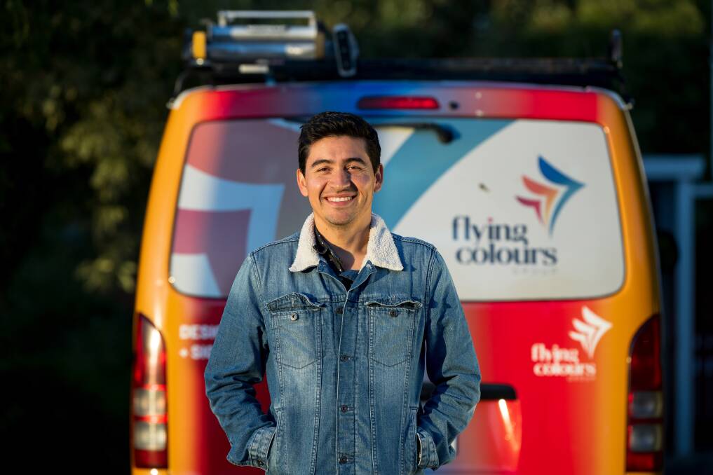 Cesar Penuela of Trevallyn with his Flying Colours work van. Picture by Phillip Biggs.