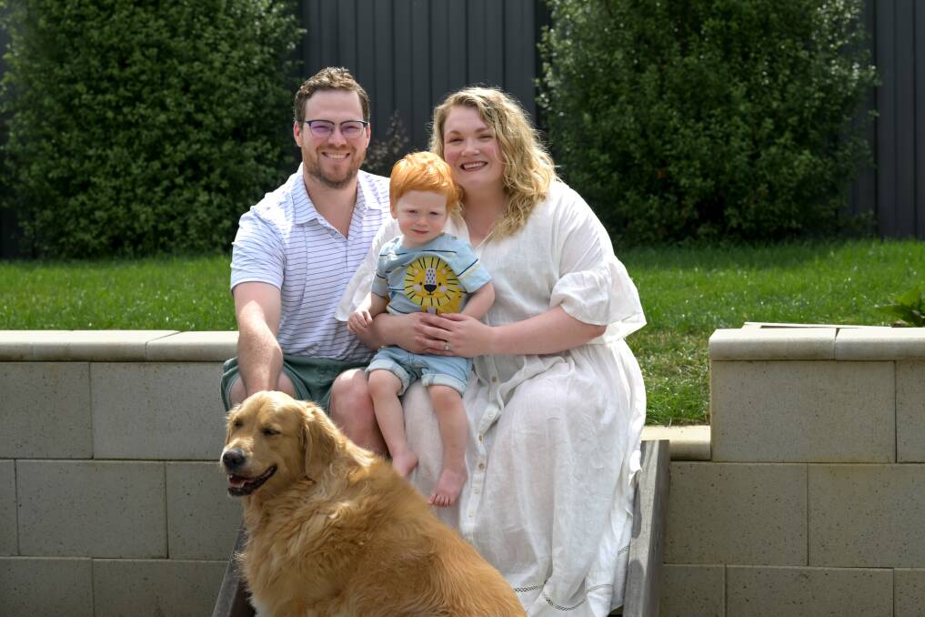 Jason McMahon with his wife Emily McMahon, son Fletcher, age 18 months, and Brinkley the dog.