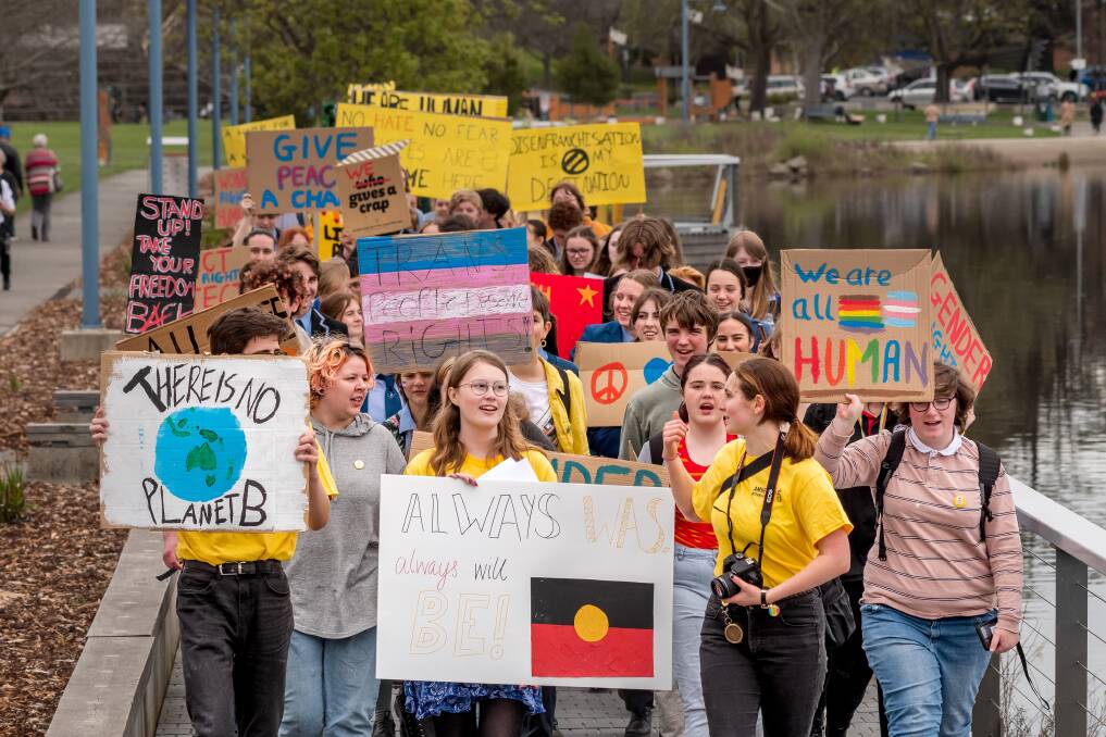 Launceston students marched from Royal Park to Riverbend Park to speak up on environmental, women's and LGBTQIA+ rights as part of the Tamar Valley Peace Festival in 2022. Picture by Phillip Biggs
