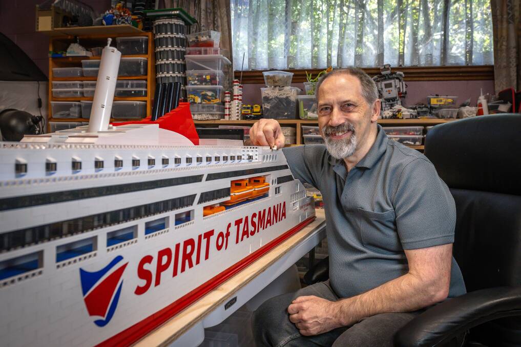 Brixhibition organiser and Lego enthusiast Ken Draeger with his new Spirit of Tasmania V ship. Pictures by Craig George
