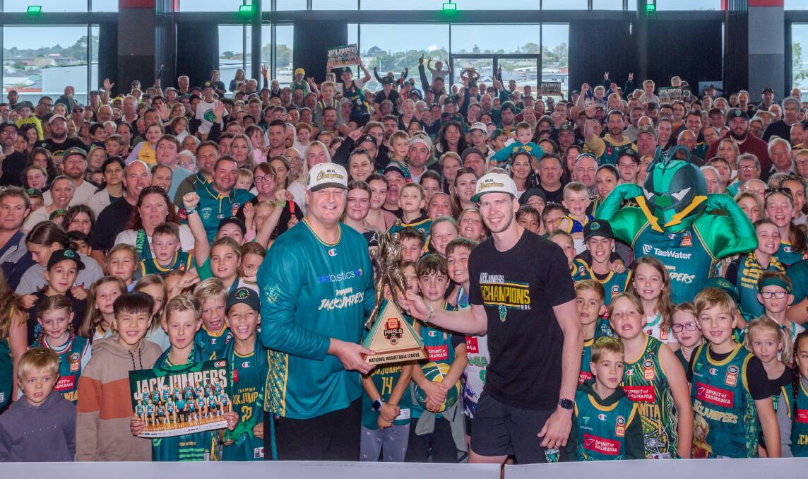 While coach Scott Roth and his players will stay at home, the Tasmania JackJumpers' maiden NBL trophy will be touring the North. Pictures supplied