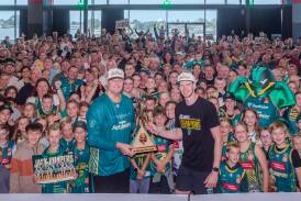 While coach Scott Roth and his players will stay at home, the Tasmania JackJumpers' maiden NBL trophy will be touring the North. Pictures supplied