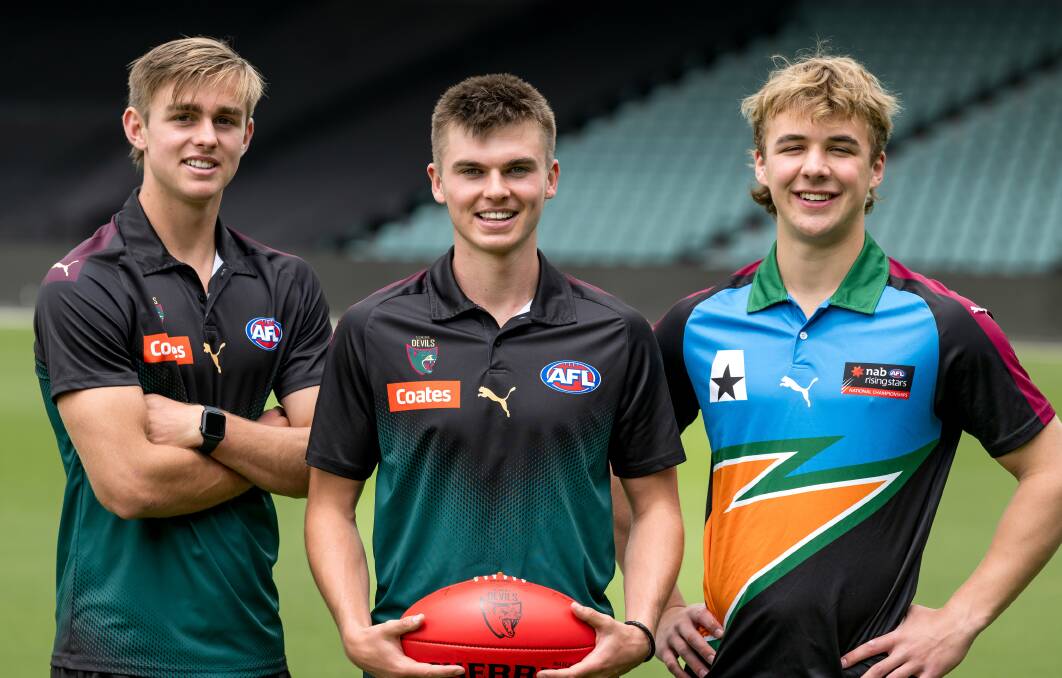 GWS Giants' James Leake, North Melbourne's Colby McKercher and Western Bulldogs' Ryley Sanders complete a trio of Launceston-born first-round picks. Pictures by Phillip Biggs and Paul Scambler
