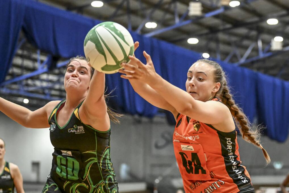 Hawks' Kendall Jones and Cavaliers' Estelle Margetts battle for the ball in the second Northern derby. Picture by Craig George