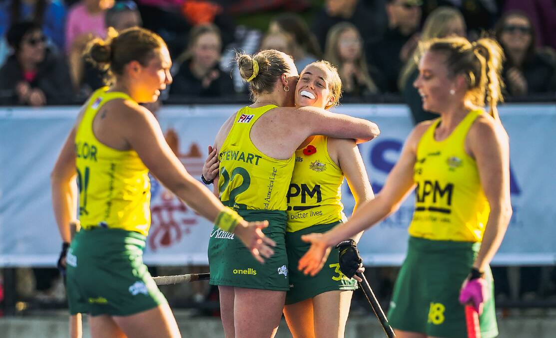 Maddison Brooks (centre right) shows her delight at playing for the Hockeyroos. Picture Hockey Australia