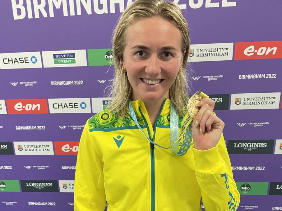 Ariarne Titmus with one of her gold medals from the 2022 Commonwealth Games. Picture TIS