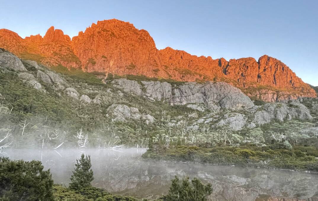 A priceless view of Cradle Mountain at dawn. Yours for $15. Picture by Rob Shaw