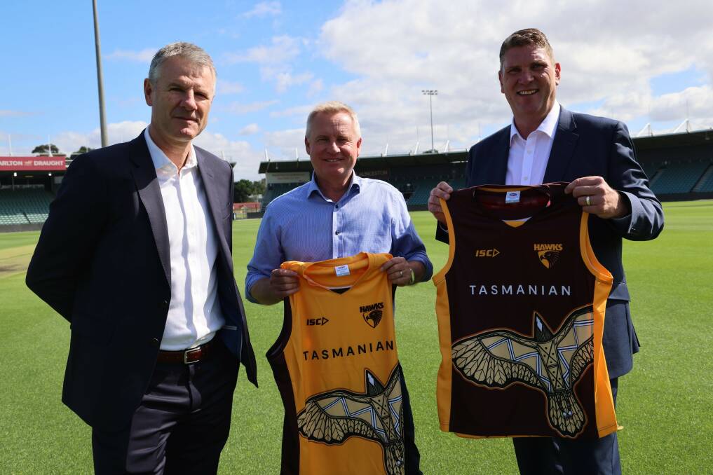 Hawthorn president Andy Gowers (left) and chief executive Justin Reeves (right) mark the club's sponsorship renewal with Tasmanian Premier Jeremy Rockliff earlier this year. Picture Twitter