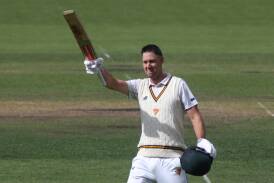 Beau Webster celebrates his century. Pictures by Rick Smith