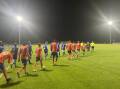 Riverside Olympic and Launceston United players take to the pitch on Friday night. Picture by Rob Shaw